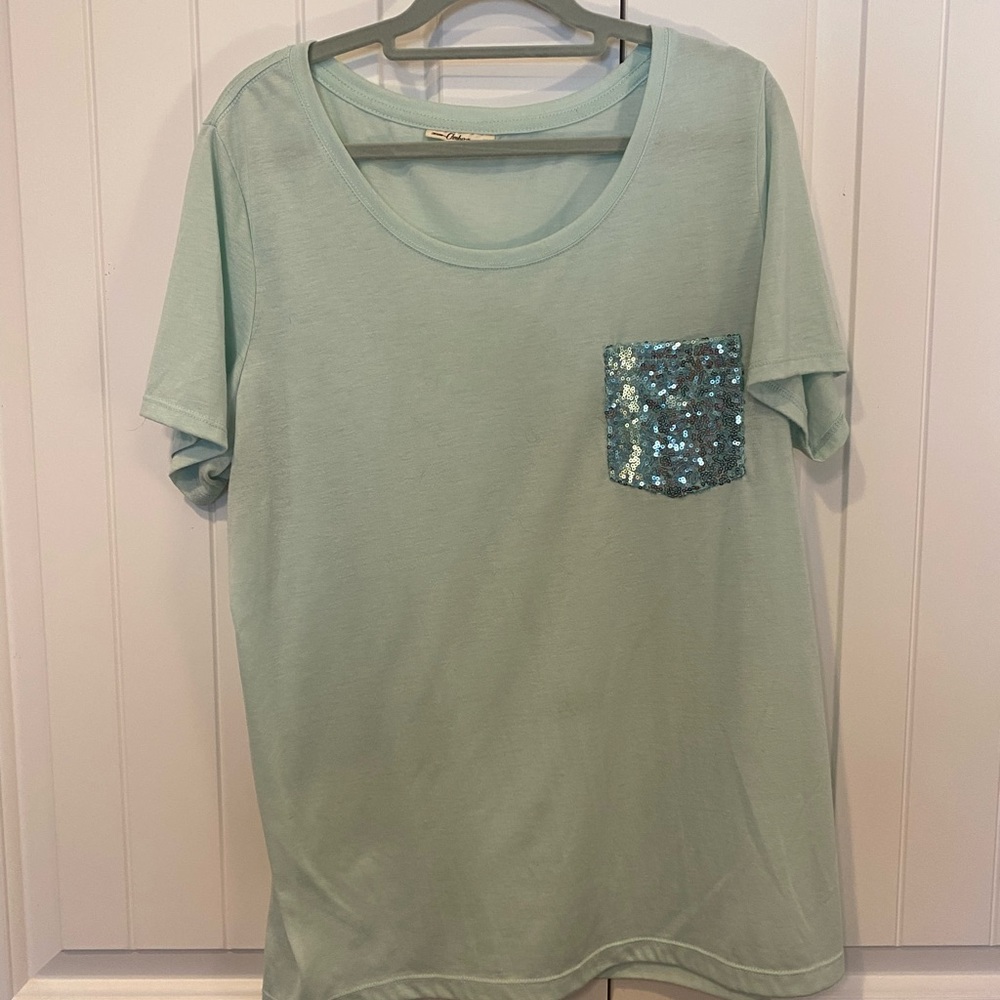 Mint green t shirt with sequin pocket